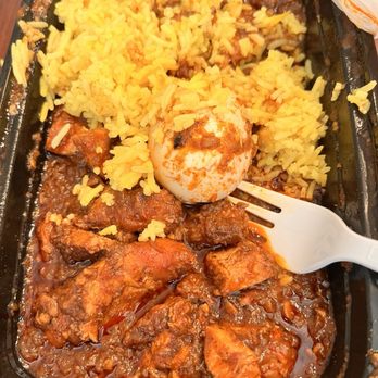 Smoke'N Ash BBQ - Smoked doro wot (I put some rice in the gravy because it needed flavor; rice was very bland.) - Barbeque Near Me - Arlington, Texas Smoke'N Ash BBQ - Smoked doro wot (I put some rice in the gravy because it needed flavor; rice was very bland.) - Barbeque Near Me - Arlington, Texas