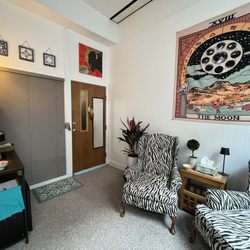 Moon Hypnosis - View of the front door and hot beverage station from inside the Moon Hypnosis office