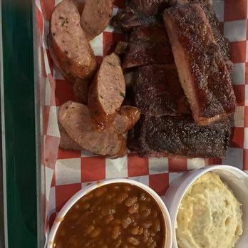 Smoke Bayou - Two meat combo Ribs, smoked sausage baked beans, potato salad and collard greens. - Barbeque Near Me - Baton Rouge, Louisiana Smoke Bayou - Two meat combo Ribs, smoked sausage baked beans, potato salad and collard greens. - Barbeque Near Me - Baton Rouge, Louisiana