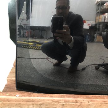 Dynamic Auto Customs SC - Tint being cut - Car Window Tinting Near Me