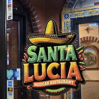 Santa Lucia - The name and logo of the restaurant on the window. - Mexican Near Me - Roanoke, Virginia Santa Lucia - The name and logo of the restaurant on the window. - Mexican Near Me - Roanoke, Virginia