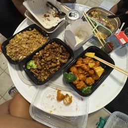 Chicken fried rice, kung pao chicken and orange chicken