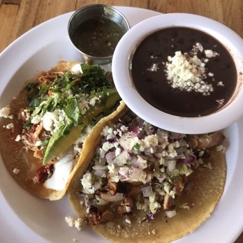Seis Kitchen - Poc chuc & chicken tinga tacos with a side of black beans and green salsa - Mexican Near Me - Tucson, Arizona Seis Kitchen - Poc chuc & chicken tinga tacos with a side of black beans and green salsa - Mexican Near Me - Tucson, Arizona