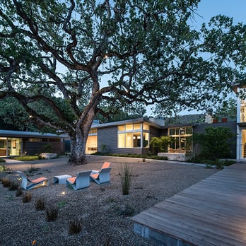 Groza Construction - a patio with seating and a tree - General Contractors Near Me - Monterey, California Groza Construction - a patio with seating and a tree - General Contractors Near Me - Monterey, California