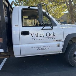 Valley Oak Landscaping - Company truck and license numbe.