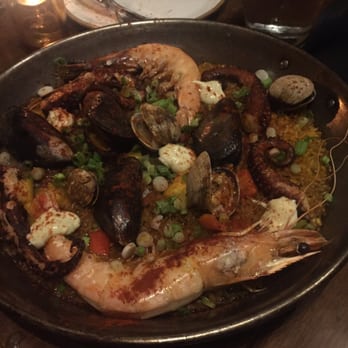 Vaca - Paella de mariscos: clams, mussels, octopus, shrimp with saffron rice. Absolutely amazing - Tapas/Small Plates Near Me - Costa Mesa, California