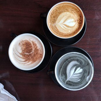 Hanjan - Unique Lattes! Charcoal Latte (right), Chai Latte (top), Regular Latte (left) - Korean Near Me - Edmonton, Alberta Hanjan - Unique Lattes! Charcoal Latte (right), Chai Latte (top), Regular Latte (left) - Korean Near Me - Edmonton, Alberta