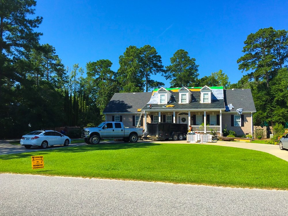 Slide of Total Roofing Solutions & Construction