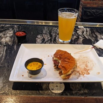 Crafthouse - Well, this is my still half burger to go, with no more fries, as, obviously, it wasn't enough...but what do I know? I'm only the customer! - Burgers Near Me - Reston, Virginia