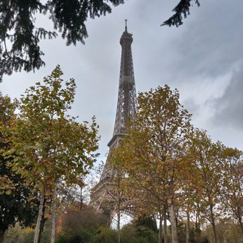 La Tour Eiffel - You can't see it but it was raining. We were waiting under the tree haha - Landmarks & Historical Buildings Near Me - Paris, 75