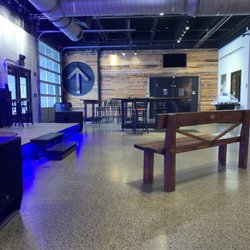 Rocketown - Indoor Seating (stage on left; arcade honkey game thing on right)