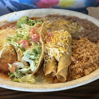 Cuca's Mexican Food - This is my friends triple combo with two chicken taquitos, chile relleno, and a beef taco, with beans, rice, and guacamole - Mexican Near Me - Foothill Ranch, California Cuca's Mexican Food - This is my friends triple combo with two chicken taquitos, chile relleno, and a beef taco, with beans, rice, and guacamole - Mexican Near Me - Foothill Ranch, California