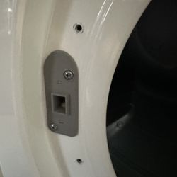 This is dryer number 2 - front frame has no screws and is completely hanging free
