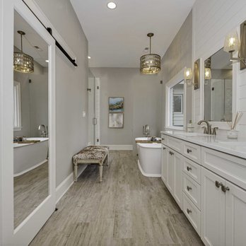 Paul Kowalski Builders - a long hallway with a bench in the center - General Contractors Near Me - Charlotte, North Carolina Paul Kowalski Builders - a long hallway with a bench in the center - General Contractors Near Me - Charlotte, North Carolina