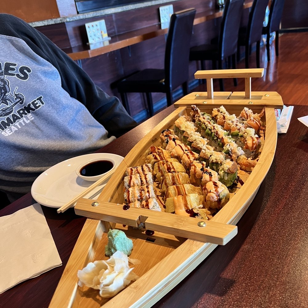 Tsuki Sushi & Grill - Interior. Boat with assorted rolls. - Sushi Bars Near Me - Lombard, Illinois Tsuki Sushi & Grill - Interior. Boat with assorted rolls. - Sushi Bars Near Me - Lombard, Illinois