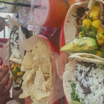 Torchy's Tacos - Democrat and jamaican jerk chicken tacos - Tex-Mex Near Me - Houston, Texas