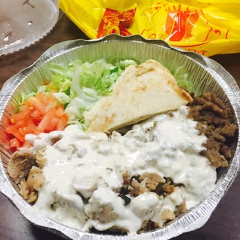 The Halal Guys - Looks amazing, but the platter is small, portions are tiny...opposite to NYC - Middle Eastern Near Me - Chicago, Illinois