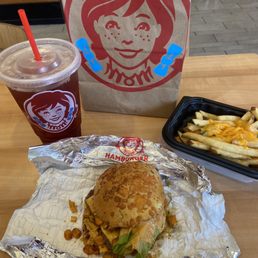 Single Nacho Cheeseburger, Queso Fries, Iced Tea Single Nacho Cheeseburger, Queso Fries, Iced Tea