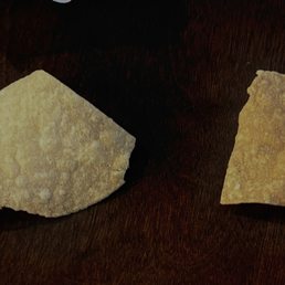 The chip on the right was with my wife's dinner. Dark and tasted like old oil. The one on the left is light and tasty.