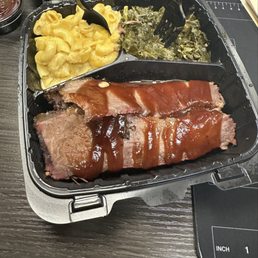 LC Brisket (1 Pound) with Mac n cheese and greens. LC Brisket (1 Pound) with Mac n cheese and greens.
