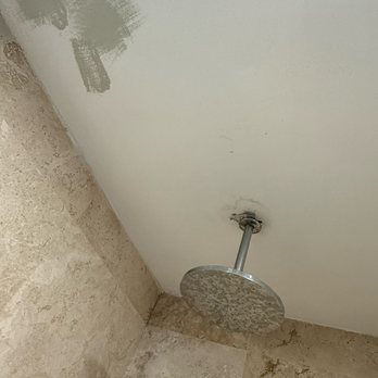 Blue Chairs Resort - Mold above the bathroom shower head and random paint. - Hotels Near Me - Puerto Vallarta, JAL Blue Chairs Resort - Mold above the bathroom shower head and random paint. - Hotels Near Me - Puerto Vallarta, JAL