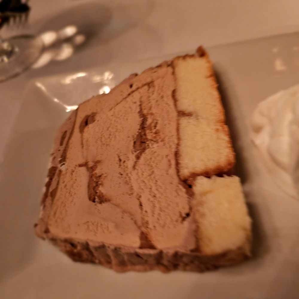 Chez Josephine - Bombe Glaceé Praline. $15. Thin but tasty. Good ice cream flavor in particular - French Near Me - New York, New York