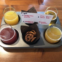 A flight of beer with complimentary pretzels!