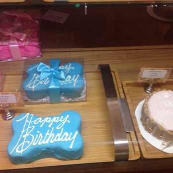 Biscuits Pet Boutique - Current selection of cakes. Bone for $19.99 and round cake for $24.00 (a little too pricey) - Pet Stores Near Me - San Jose, California