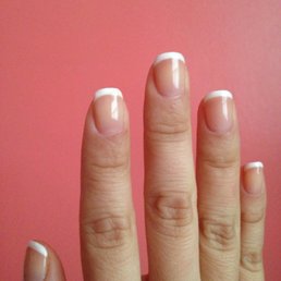 Right hand with French gel manicure using CND polish