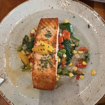 Rockwood Grill - Salmon on a bed of veggies - American Near Me - Palm Desert, California Rockwood Grill - Salmon on a bed of veggies - American Near Me - Palm Desert, California