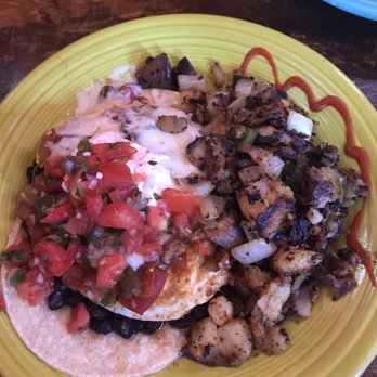Millie's Diner - Huevos Rancheros. Not my favorite. A lot of heat. - New American Near Me - Richmond, Virginia Millie's Diner - Huevos Rancheros. Not my favorite. A lot of heat. - New American Near Me - Richmond, Virginia