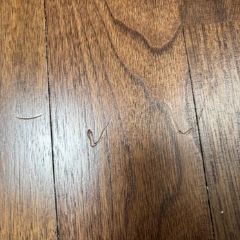 Textbook Painting - Another example of hardwood floor damage - Painters Near Me - Cleveland, Ohio Textbook Painting - Another example of hardwood floor damage - Painters Near Me - Cleveland, Ohio