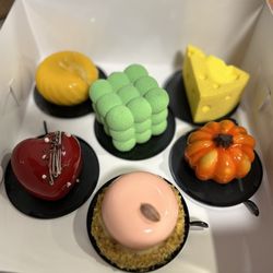 Tisto Cakes - Cheesecake, Mango Pineapple, Chocolate Strawberry, Chocolate Cherry, pumpkin shaped one (sure what the flavor was),Pistachio Cherry mousse