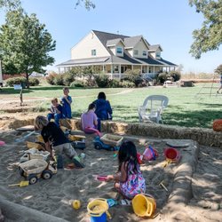 Book Family Farm - And a cute sand pit for kiddos to play in!