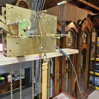 Central Clock Repair - Grandfather Clock mechanism in testing. - Clock Repair Near Me