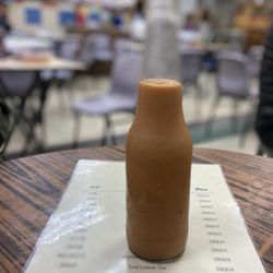 瑞記咖啡 - Cold milk tea served in a bottle here