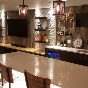 4 Seasons Construction - Basement remodel with bar & entertainment wall refinish - General Contractors Near Me - Denver, Colorado 4 Seasons Construction - Basement remodel with bar & entertainment wall refinish - General Contractors Near Me - Denver, Colorado