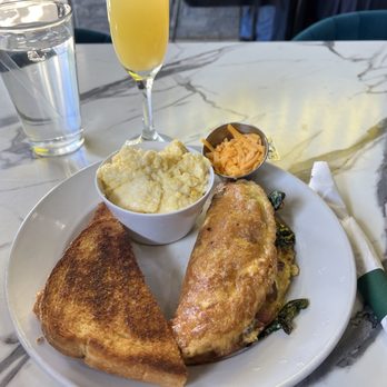 Poach Social - Poach Social Omelette with Grits, (Grilled!) Toast, and a Mimosa! (*Don't worry, I asked for my omelette extra well done and he nailed it!) - Breakfast & Brunch Near Me - Atlanta, Georgia Poach Social - Poach Social Omelette with Grits, (Grilled!) Toast, and a Mimosa! (*Don't worry, I asked for my omelette extra well done and he nailed it!) - Breakfast & Brunch Near Me - Atlanta, Georgia