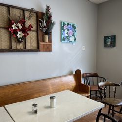 The Homestead Deli & Bakery - The back room has big bright windows that face the street.
