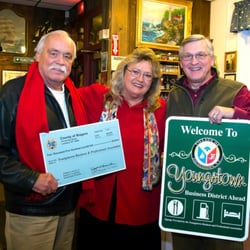 Anchor Spirits - Clyde Burmaster, Cheryl and Mark Butera receiving check from grant for YBPA