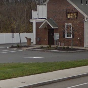 Dunkin' - a brick building with a sign in front of it - Donuts Near Me - Wakefield, Massachusetts Dunkin' - a brick building with a sign in front of it - Donuts Near Me - Wakefield, Massachusetts