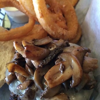 Fishers Grille - Mushroom Swiss burger and onion rings - Pubs Near Me - Greensboro, North Carolina Fishers Grille - Mushroom Swiss burger and onion rings - Pubs Near Me - Greensboro, North Carolina