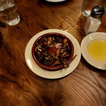 Barcelona Wine Bar - Half eaten mushrooms a la plancha - Spanish Near Me - Cambridge, Massachusetts