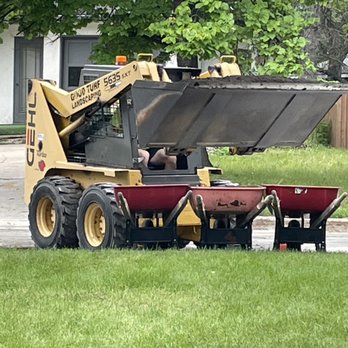 Good Turf Landscaping Services - a tractor with a spreader - Landscaping Near Me - Winnipeg, Manitoba Good Turf Landscaping Services - a tractor with a spreader - Landscaping Near Me - Winnipeg, Manitoba