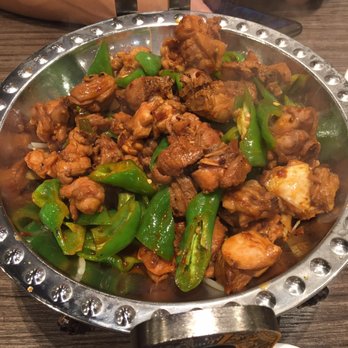 Yang's BBQ Restaurant - stir fry chicken in a dry wok - Barbeque Near Me - Toronto, Ontario Yang's BBQ Restaurant - stir fry chicken in a dry wok - Barbeque Near Me - Toronto, Ontario