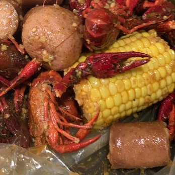 Angry Crab Shack - Live Crawfish boil - 2 potatoes - 4 pieces of sausage - 1piece of corn (seasoned garlic hot) - Seafood Near Me - Mesa, Arizona