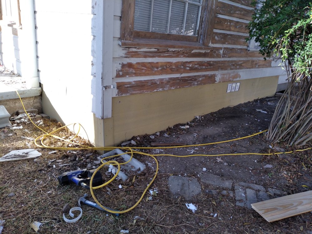 Slide of New Millennium House Remodeling