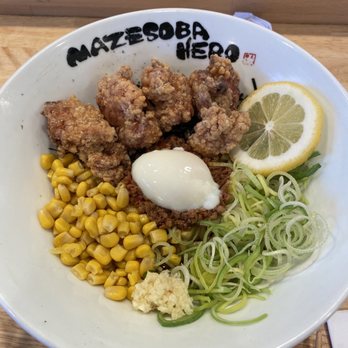 Mazesoba Hero - Crown Mazesoba 3 pieces of Karaage chicken Minced Pork Poached egg Corn Garlic Spring onion Broth at bottom - Ramen Near Me - Walnut, California Mazesoba Hero - Crown Mazesoba 3 pieces of Karaage chicken Minced Pork Poached egg Corn Garlic Spring onion Broth at bottom - Ramen Near Me - Walnut, California