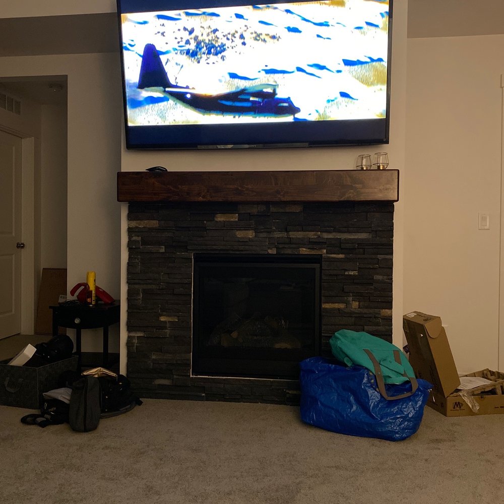 70 inch TV mounted above fireplace 70 inch TV mounted above fireplace
