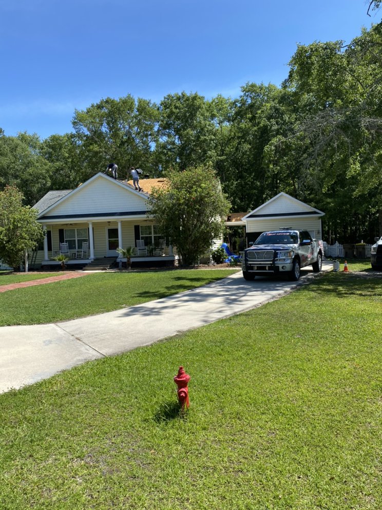 Slide of Roof Medics